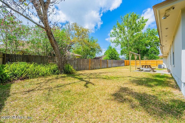 1218 Shallowford Dr E, Jacksonville, FL 32225 - view of yard with a patio and central AC unit