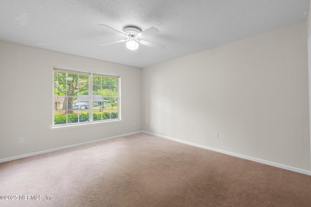 1218 Shallowford Dr E, Jacksonville, FL 32225 - unfurnished room with ceiling fan, a textured ceiling, carpet floors, and baseboards