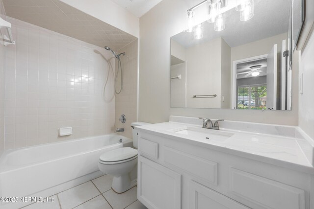 1218 Shallowford Dr E, Jacksonville, FL 32225 - bathroom featuring tile patterned flooring, toilet, tub / shower combination, vanity, and a ceiling fan