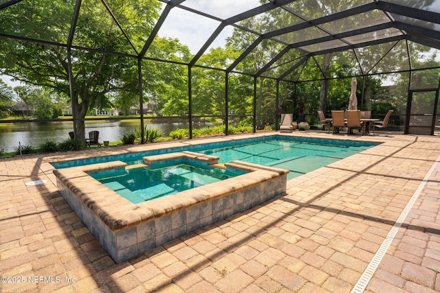 3771 Saltmeadow Ct S, Jacksonville, FL 32224 - view of swimming pool featuring a pool with connected hot tub, a patio area, outdoor dining space, a water view, and a lanai