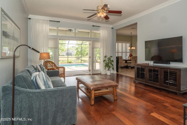 3771 Saltmeadow Ct S, Jacksonville, FL 32224 - living room with a ceiling fan, crown molding, wood finished floors, and a chandelier