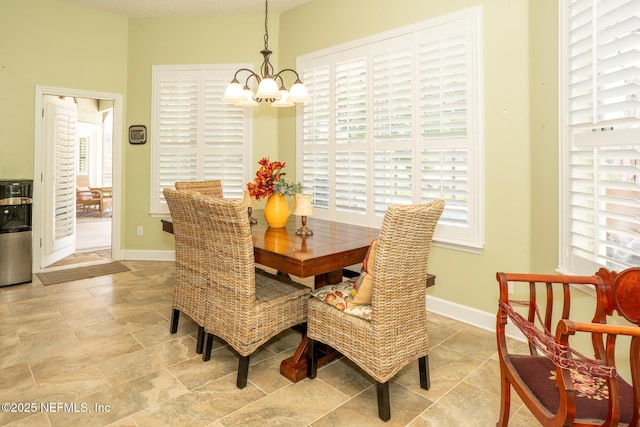3771 Saltmeadow Ct S, Jacksonville, FL 32224 - dining space with a chandelier and baseboards