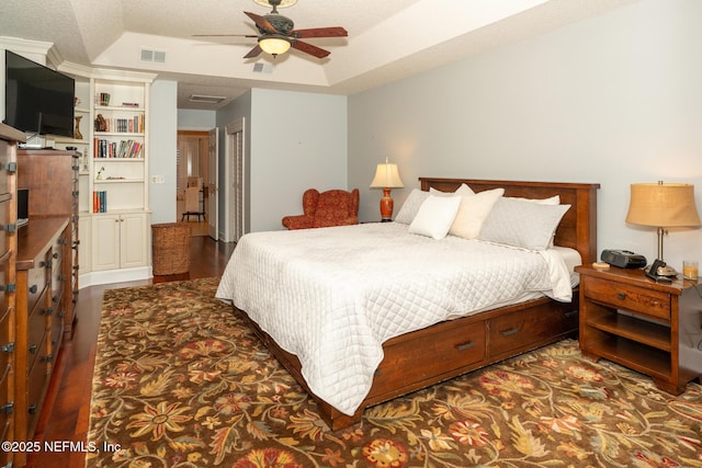 3771 Saltmeadow Ct S, Jacksonville, FL 32224 - bedroom with a tray ceiling, wood finished floors, and a ceiling fan