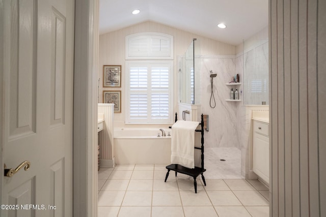 3771 Saltmeadow Ct S, Jacksonville, FL 32224 - full bath featuring a walk in shower, a garden tub, lofted ceiling, tile patterned flooring, and vanity