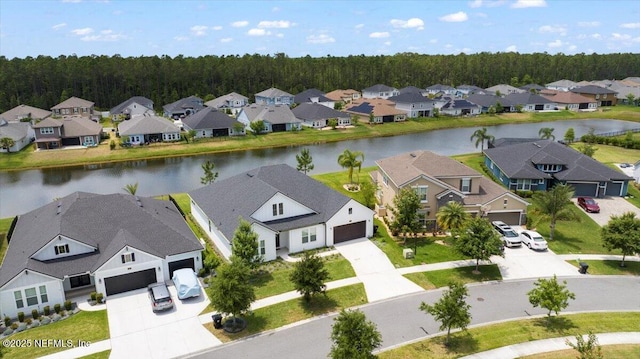 982 Oakland Hills Ave, Middleburg, FL 32068 - aerial view with a wooded view, a water view, and a residential view