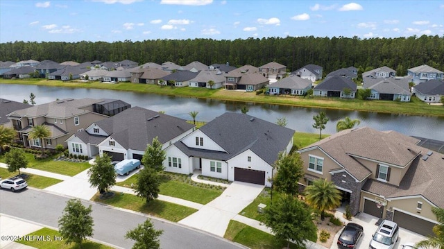 982 Oakland Hills Ave, Middleburg, FL 32068 - bird's eye view featuring a water view, a view of trees, and a residential view