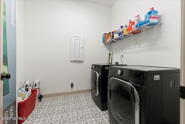 982 Oakland Hills Ave, Middleburg, FL 32068 - washroom with laundry area, baseboards, electric panel, and separate washer and dryer