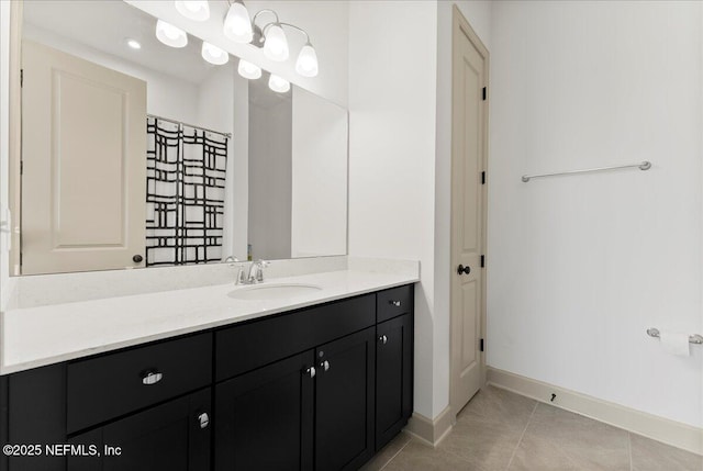 982 Oakland Hills Ave, Middleburg, FL 32068 - full bath featuring vanity, baseboards, and tile patterned flooring