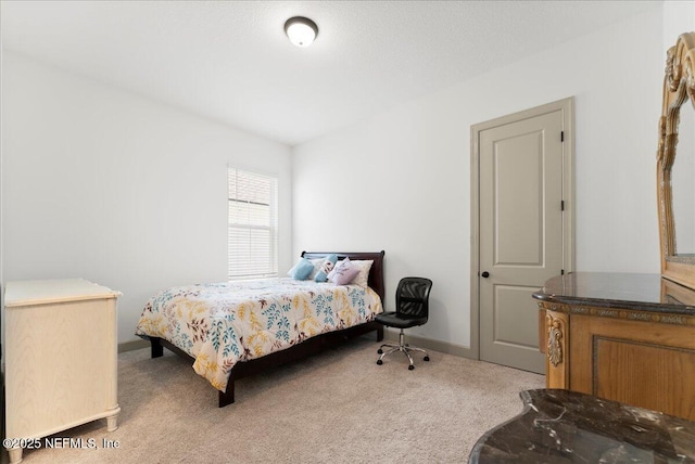 982 Oakland Hills Ave, Middleburg, FL 32068 - bedroom with baseboards and light carpet