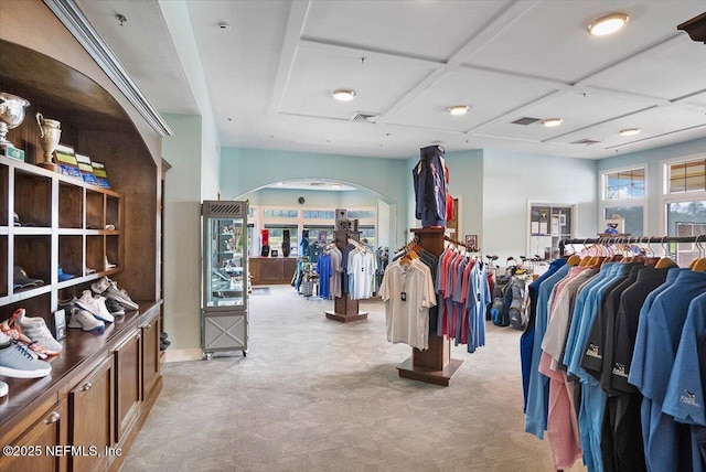 982 Oakland Hills Ave, Middleburg, FL 32068 - interior space with coffered ceiling, arched walkways, light colored carpet, and visible vents