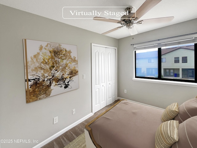 carpeted bedroom featuring baseboards, a ceiling fan, and a closet