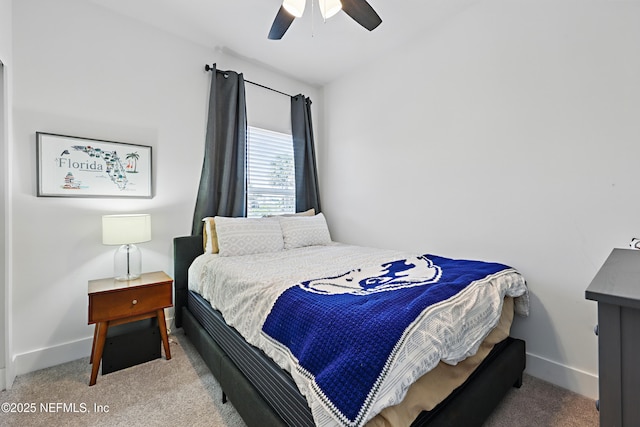 bedroom with carpet floors, baseboards, and ceiling fan