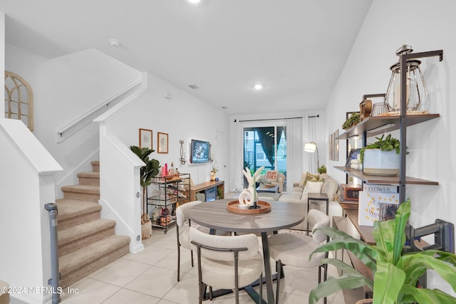 dining area featuring stairway, light tile patterned floors, and recessed lighting