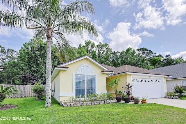 1558 Roseberry Ct, Fleming Island, FL 32003 - single story home with a front yard, stucco siding, concrete driveway, an attached garage, and fence