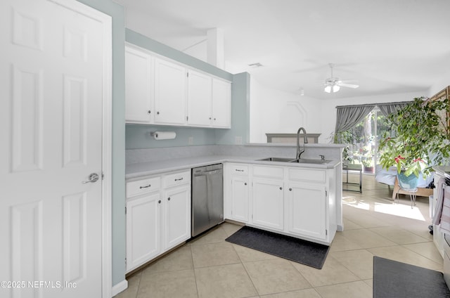 1558 Roseberry Ct, Fleming Island, FL 32003 - kitchen featuring white cabinetry, a peninsula, dishwasher, and a sink