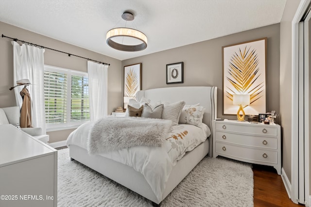 1576 Linkside Dr, Fleming Island, FL 32003 - bedroom featuring baseboards and wood finished floors