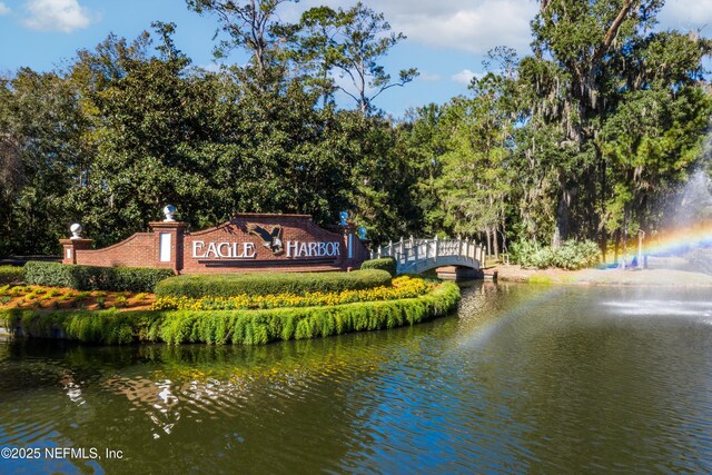 1576 Linkside Dr, Fleming Island, FL 32003 - community / neighborhood sign featuring a water view