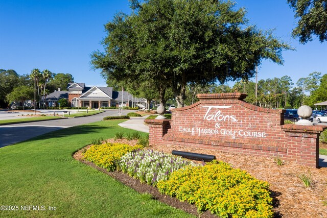 1576 Linkside Dr, Fleming Island, FL 32003 - community / neighborhood sign with a lawn