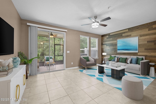 133 San Briso Way, Saint Augustine, FL 32092 - living area with a ceiling fan, an accent wall, and wooden walls