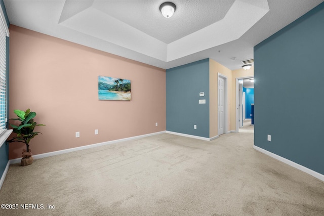 133 San Briso Way, Saint Augustine, FL 32092 - unfurnished room featuring a raised ceiling and light carpet