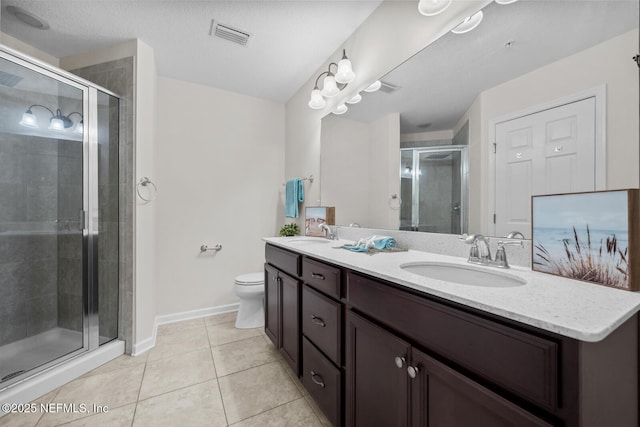 133 San Briso Way, Saint Augustine, FL 32092 - bathroom with double vanity, tile patterned floors, and a shower stall