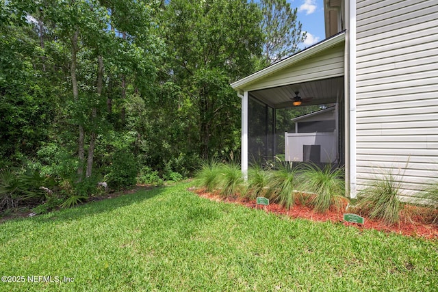 133 San Briso Way, Saint Augustine, FL 32092 - view of green lawn featuring a ceiling fan and a sunroom