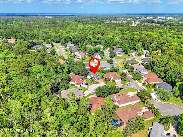 2427 Green Glade Ct, Fleming Island, FL 32003 - aerial overview of property's location featuring a heavily wooded area and nearby suburban area