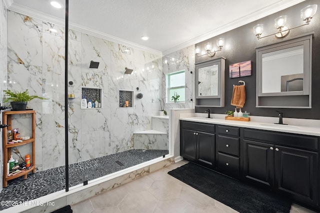 bathroom with ornamental molding and a sink