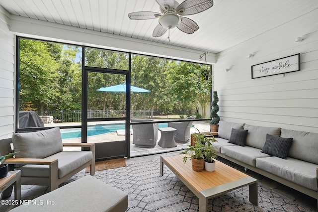 sunroom / solarium featuring a healthy amount of sunlight