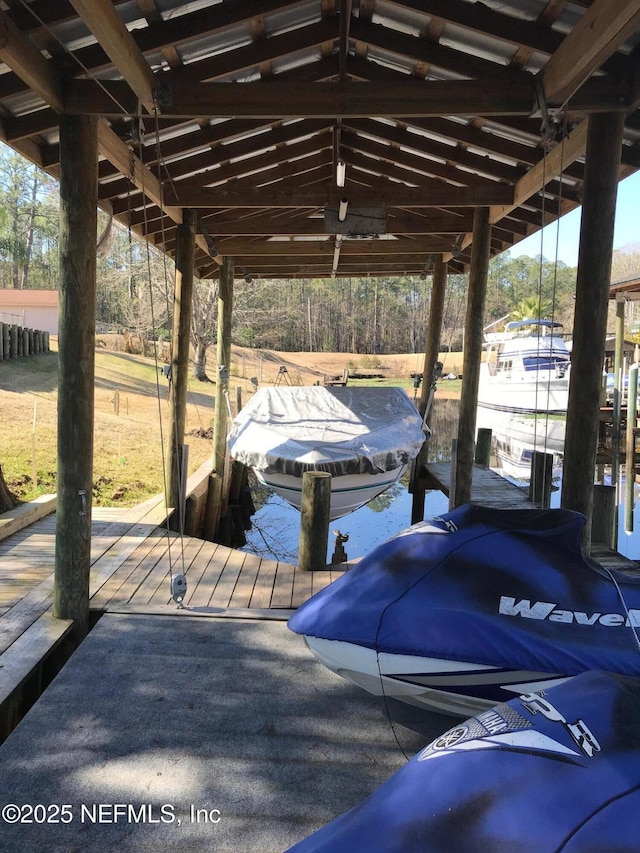 view of dock featuring boat lift