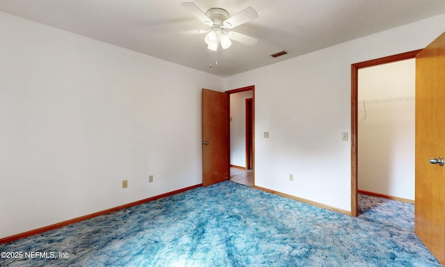 4041 Saddlehorn Trl, Middleburg, FL 32068 - empty room with ceiling fan, carpet flooring, and baseboards