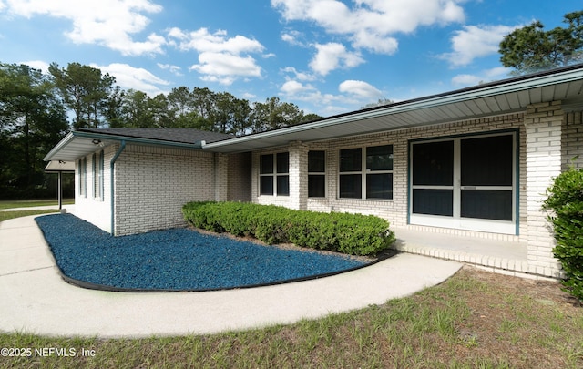 4041 Saddlehorn Trl, Middleburg, FL 32068 - view of home's exterior with brick siding