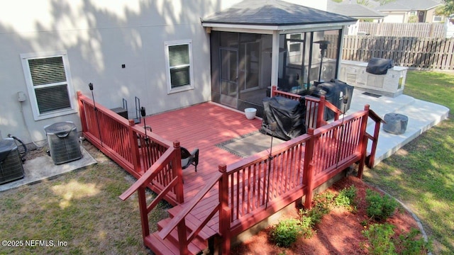 15717 Basil Creek Ct, Jacksonville, FL 32218 - deck with a sunroom and central AC