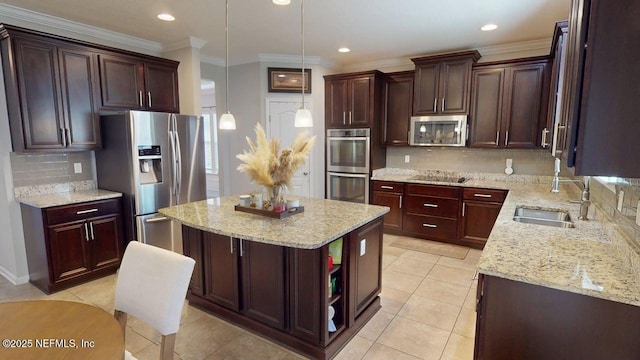 15717 Basil Creek Ct, Jacksonville, FL 32218 - kitchen with stainless steel appliances, a sink, a kitchen island, backsplash, and light stone countertops