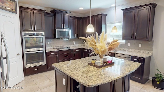 15717 Basil Creek Ct, Jacksonville, FL 32218 - kitchen featuring stainless steel appliances, light tile patterned floors, decorative backsplash, pendant lighting, and dark brown cabinetry