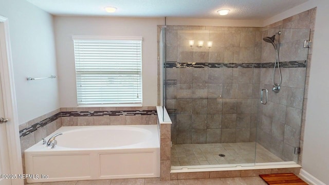 15717 Basil Creek Ct, Jacksonville, FL 32218 - bathroom featuring a garden tub and a stall shower