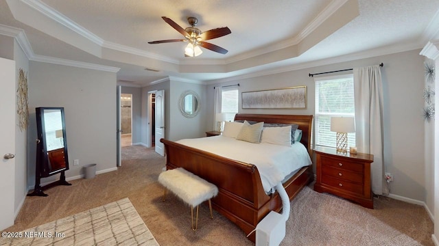 15717 Basil Creek Ct, Jacksonville, FL 32218 - bedroom featuring light colored carpet, a raised ceiling, crown molding, baseboards, and a ceiling fan