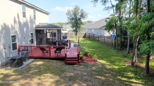 15717 Basil Creek Ct, Jacksonville, FL 32218 - view of yard with a sunroom, a wooden deck, and central AC