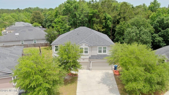 15717 Basil Creek Ct, Jacksonville, FL 32218 - view from above of property featuring a heavily wooded area