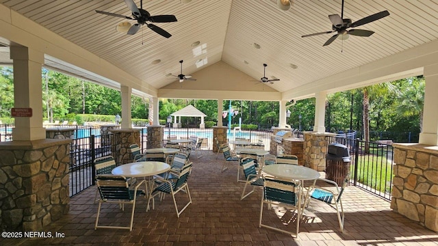 15717 Basil Creek Ct, Jacksonville, FL 32218 - view of patio with ceiling fan, a gazebo, and view of wooded area