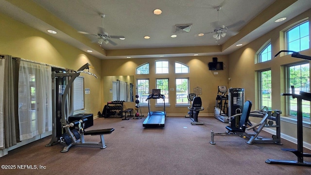 15717 Basil Creek Ct, Jacksonville, FL 32218 - workout area with ceiling fan, recessed lighting, healthy amount of natural light, baseboards, and a high ceiling