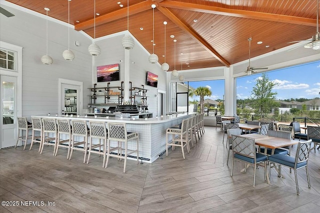 exterior space with a ceiling fan, a gazebo, and outdoor wet bar