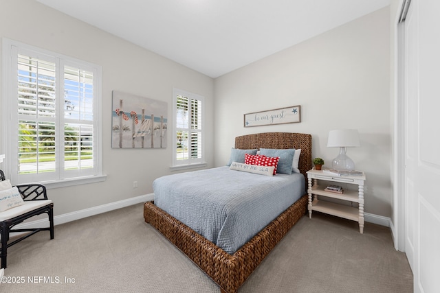 31 Tesoro Ter, Saint Augustine, FL 32095 - bedroom featuring baseboards, carpet flooring, and multiple windows
