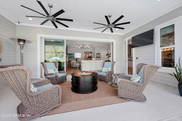 31 Tesoro Ter, Saint Augustine, FL 32095 - view of patio / terrace with a ceiling fan and an outdoor living space with a fire pit