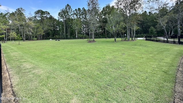 view of yard with fence