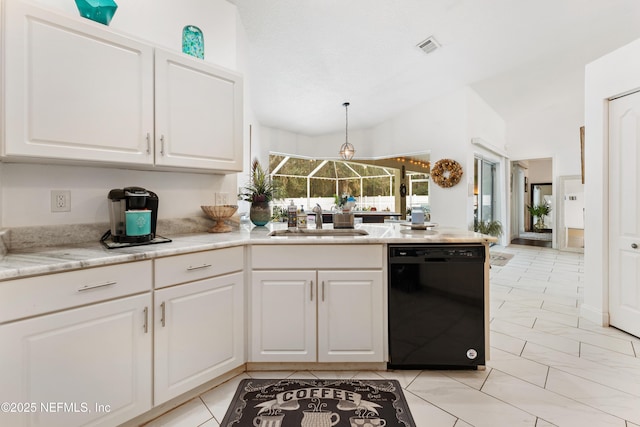 kitchen with white cabinets, a sink, visible vents, dishwasher, and vaulted ceiling