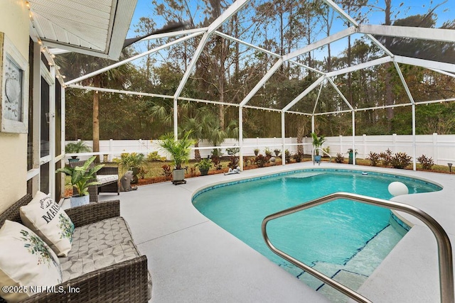 view of swimming pool featuring a fenced in pool, a patio, and a fenced backyard