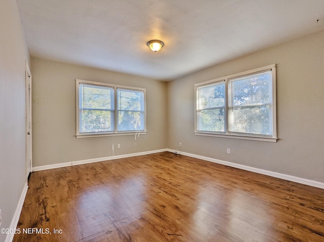 2636 Post St, Jacksonville, FL 32204 - empty room featuring wood finished floors and baseboards
