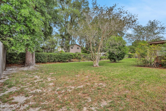 view of yard with fence
