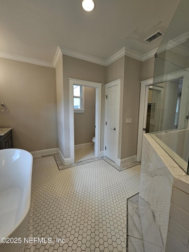 bathroom with visible vents, ornamental molding, baseboards, and toilet